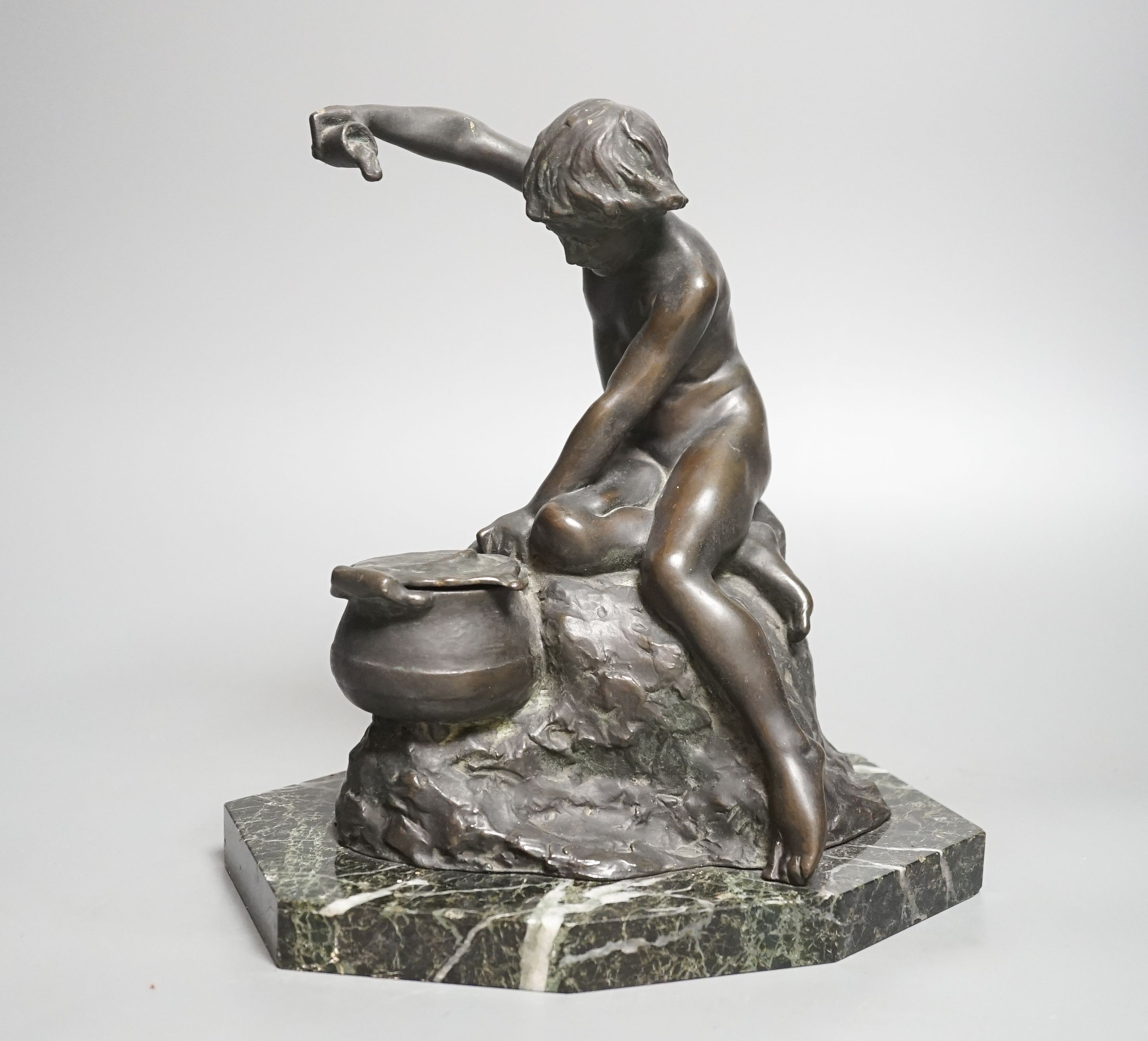 Lucy Gwendolen Williams (1870-1955). A bronze figure of a seated youth, green marble plinth, 24cm high